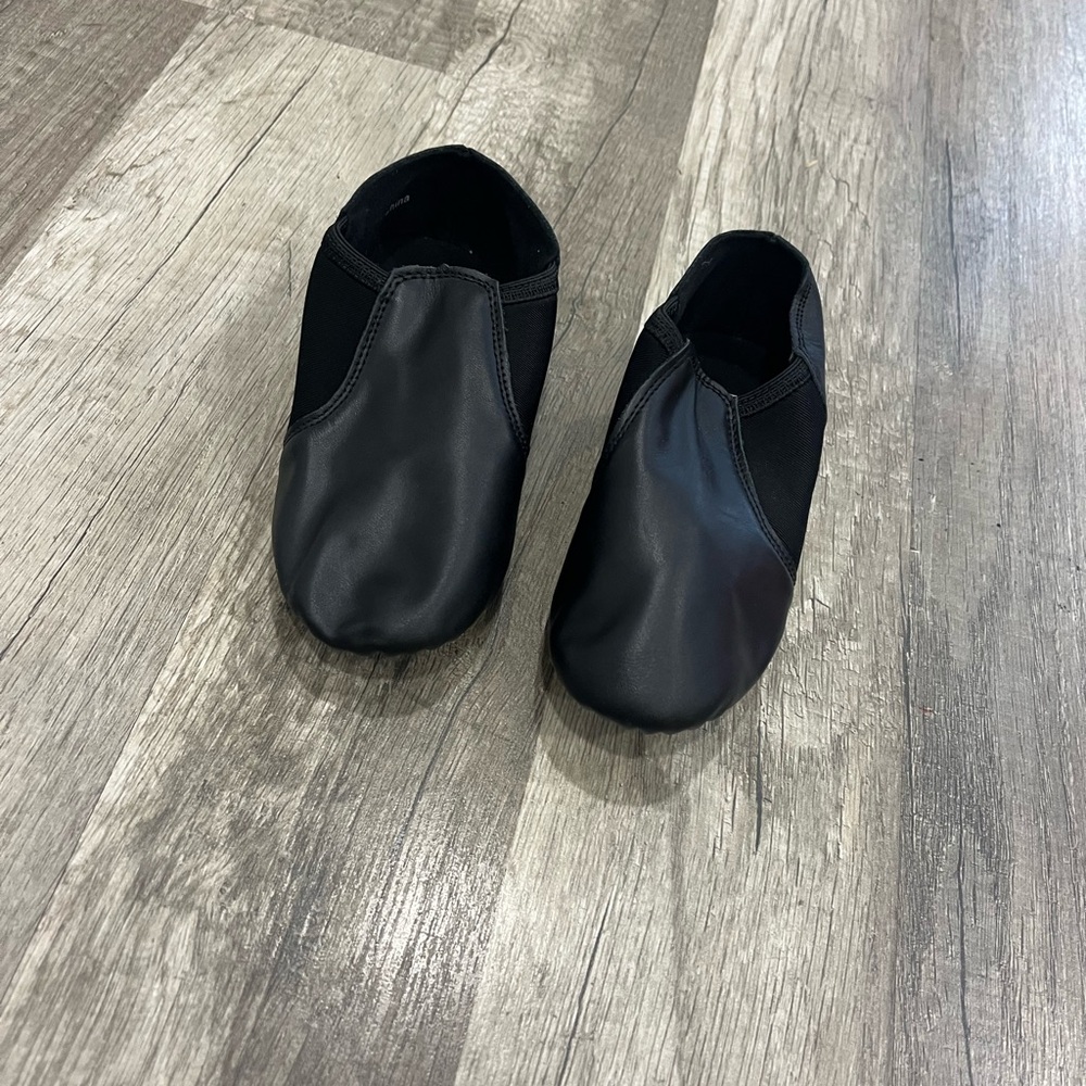 Black kids jazz or theatre shoes